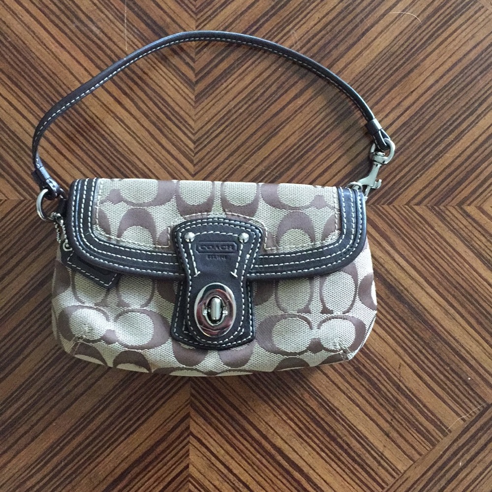 Locking two pocket coach wristlet